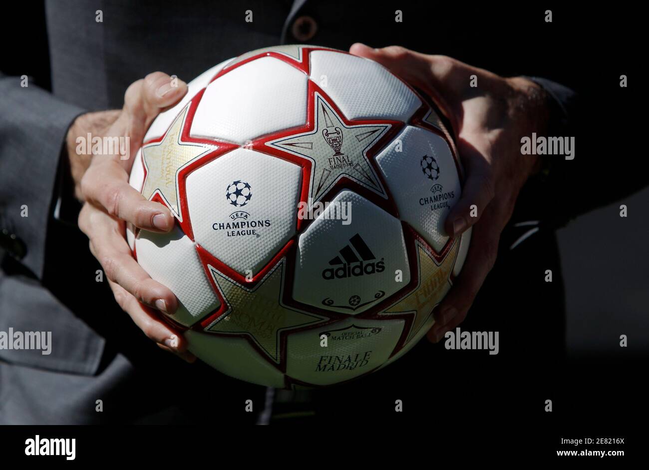 Former Real Madrid's player Fernando Hierro holds the ball of this year's  Champions League final match during its presentation ceremony at Santiago  Bernabeu stadium in Madrid March 9, 2010. REUTERS/Sergio Perez (SPAIN -