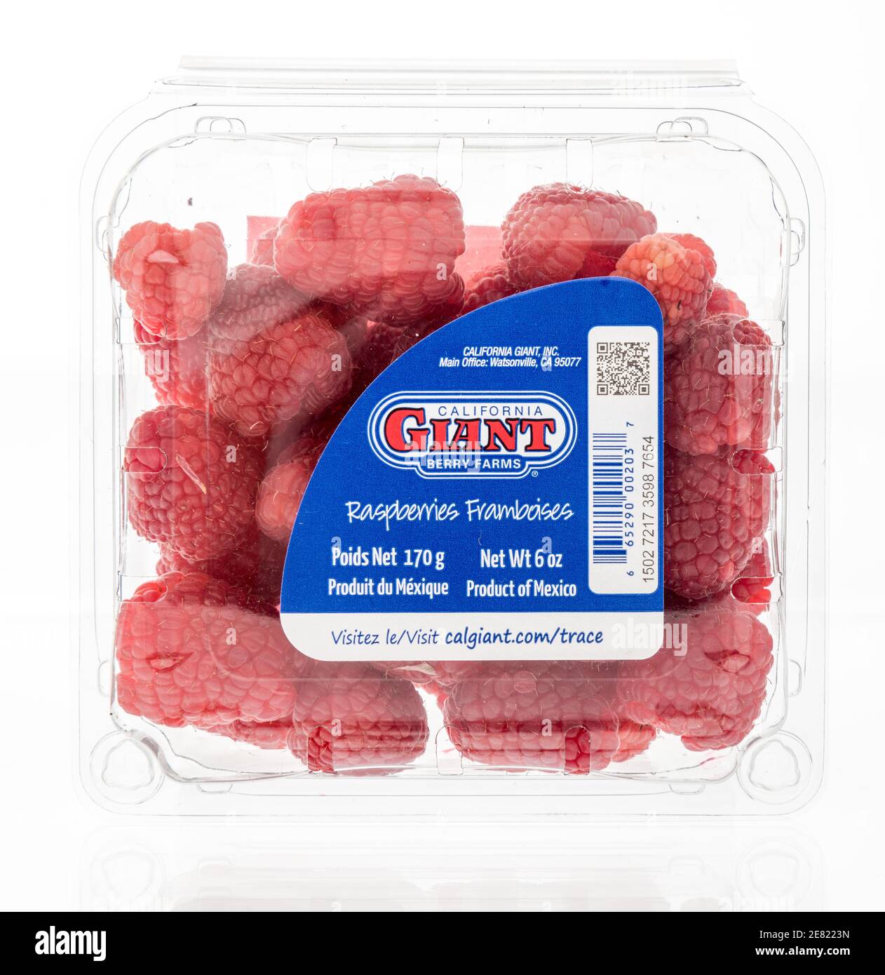 Winneconne, WI -23 January 2021: A package of California giant berry farms raspberries on an isolated background. Stock Photo