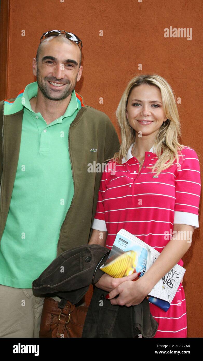 Jerome Alonso and his wife pose in the 'Village', the VIP area of the French Open at Roland Garros arena in Paris, France on June 1, 2007. Photo by ABACAPRESS.COM Stock Photo