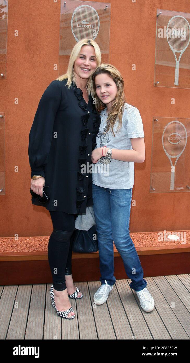 French TV presenter Sophie Favier and her daughter Carla-Marie pose in the 'Village', the VIP area of the French Open at Roland Garros arena in Paris, France on June 3, 2007. Photo by ABACAPRESS.COM Stock Photo