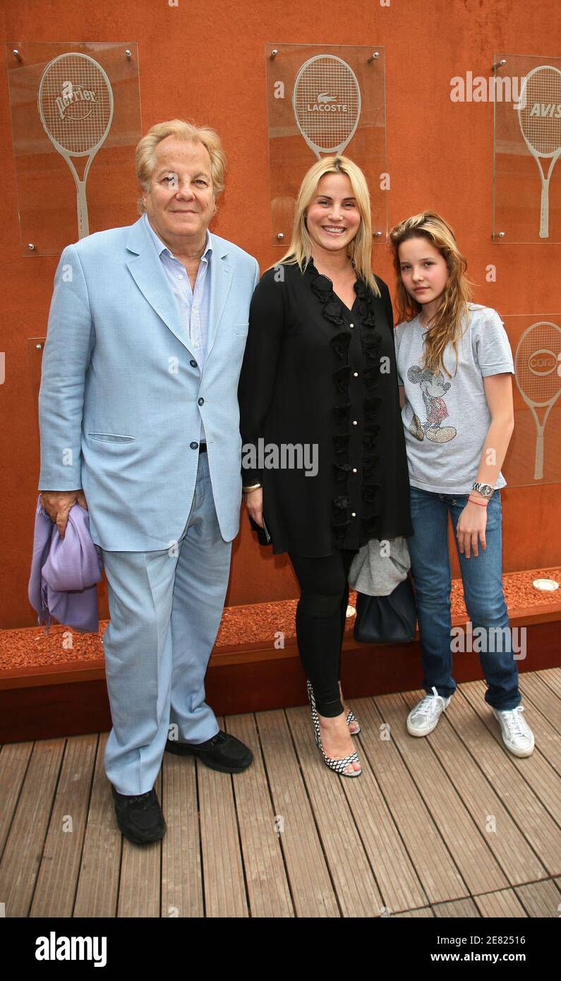 Massimo Gargia, French TV presenter Sophie Favier and her daughter Carla-Marie pose in the 'Village', the VIP area of the French Open at Roland Garros arena in Paris, France on June 3, 2007. Photo by ABACAPRESS.COM Stock Photo