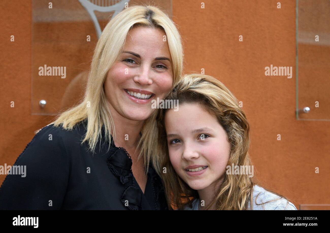 French TV presenter Sophie Favier and her daughter Carla-Marie pose in the 'Village', the VIP area of the French Open at Roland Garros arena in Paris, France on June 3, 2007. Photo by ABACAPRESS.COM Stock Photo