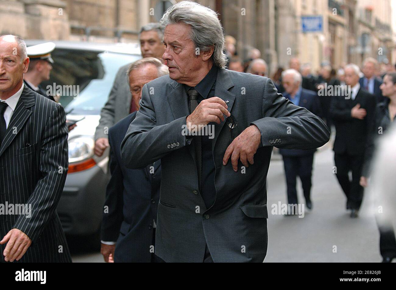 French actor Alain Delon leaves the Funeral mass for French actor Jean- Claude Brialy held at 'Saint-Louis Church' in Paris, France on June 4,  2007. Photo by ABACAPRESS.COM Stock Photo - Alamy