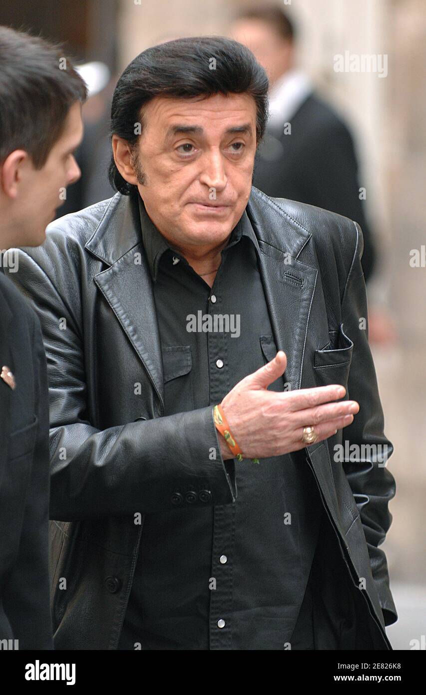 French rocker Dick Rivers arrives at the funeral mass for French actor ...