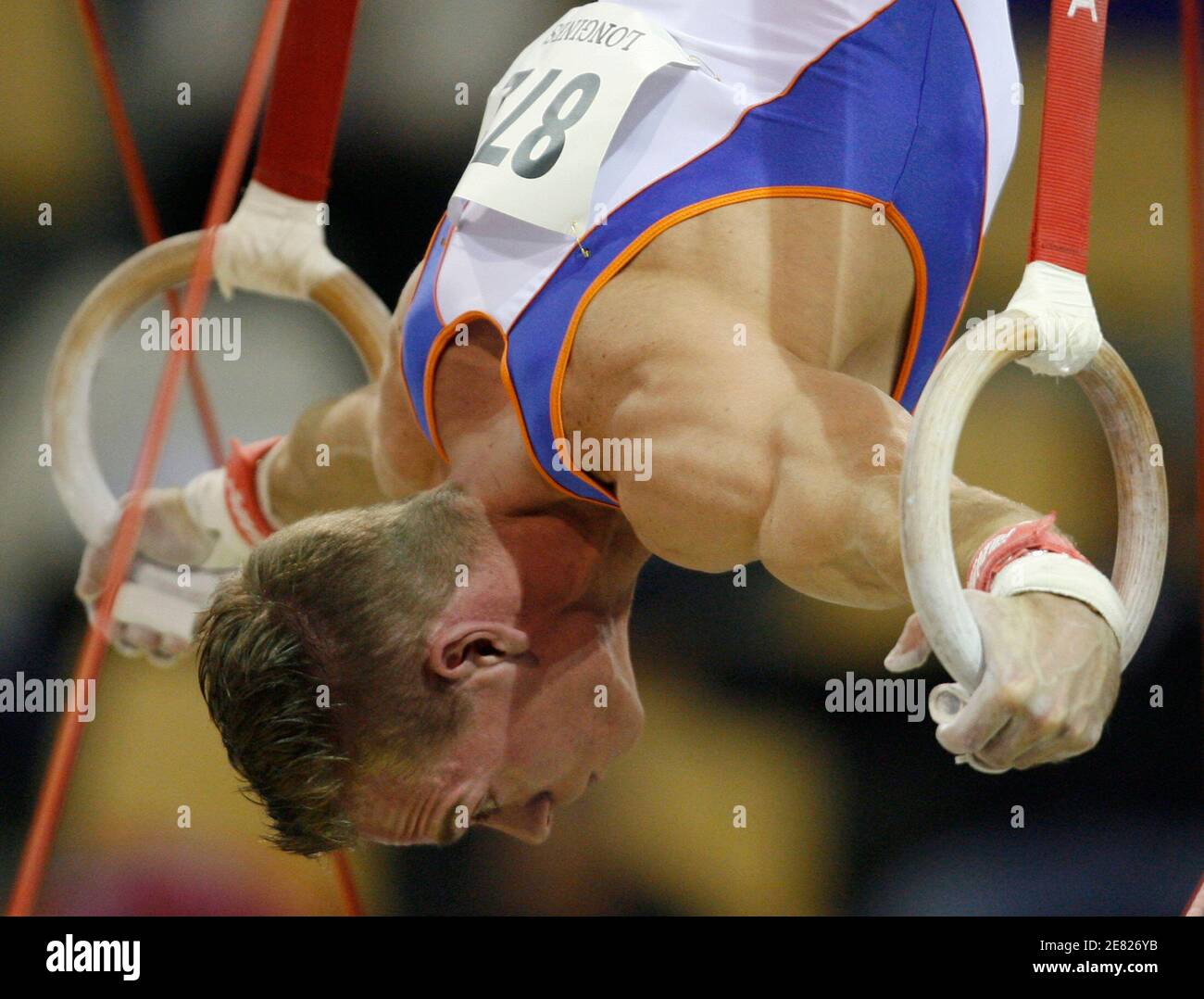 The Netherlands' Yuri Van Gelder competes on the rings during the men's qualification at the 39th Artistic Gymnastics World Championships in Aarhus, October 14, 2006. REUTERS/Wolfgang Rattay (DENMARK Stock Photo -