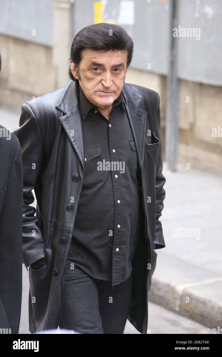 Dick Rivers arrives at the funeral mass for French actor JeanClaude