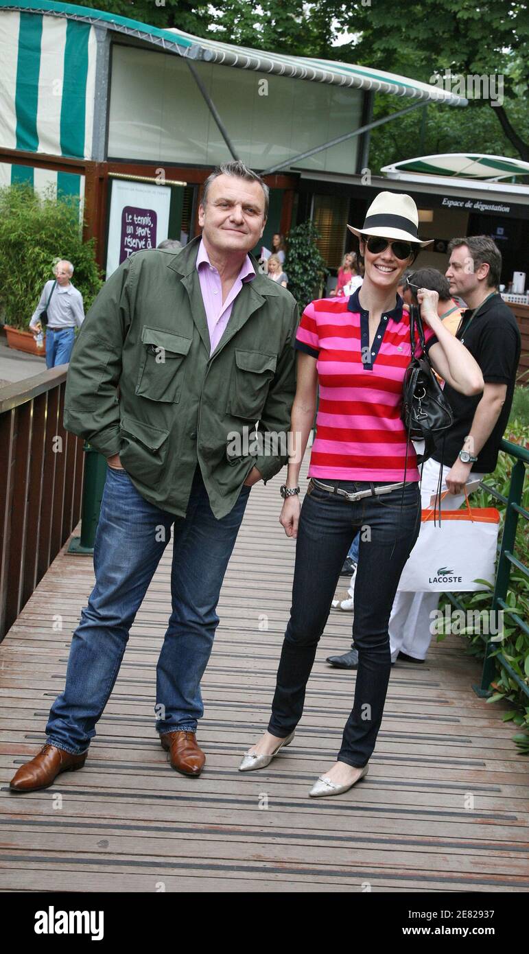 Jean-Charles de Castelbajac and his wife Mareva Galanter pose in the  'Village', the VIP area of the French Open at Roland Garros arena in Paris,  France on June 5, 2007. Photo by