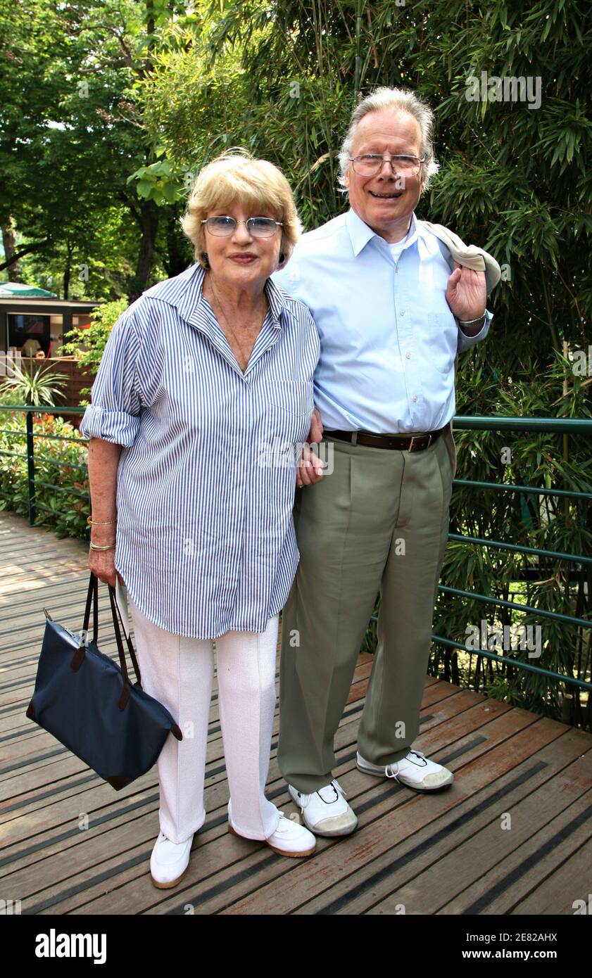 French actor Jean Piat and his wife writer Francoise Dorin arrive in the  'Village', the VIP area of the French Open at Roland Garros arena in Paris,  France on June 6, 2007.