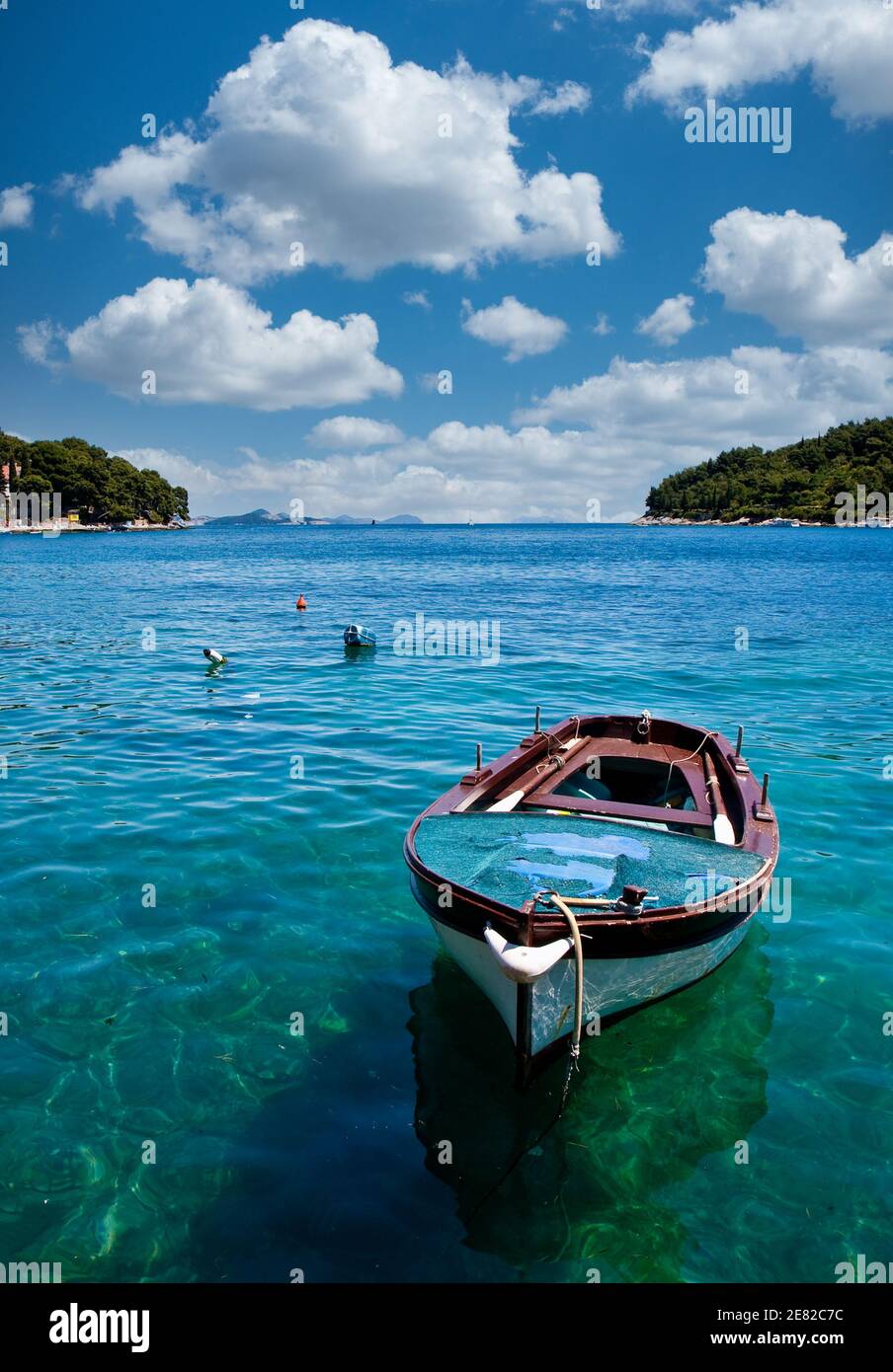 Boats on clear blue hi-res stock photography and images - Alamy
