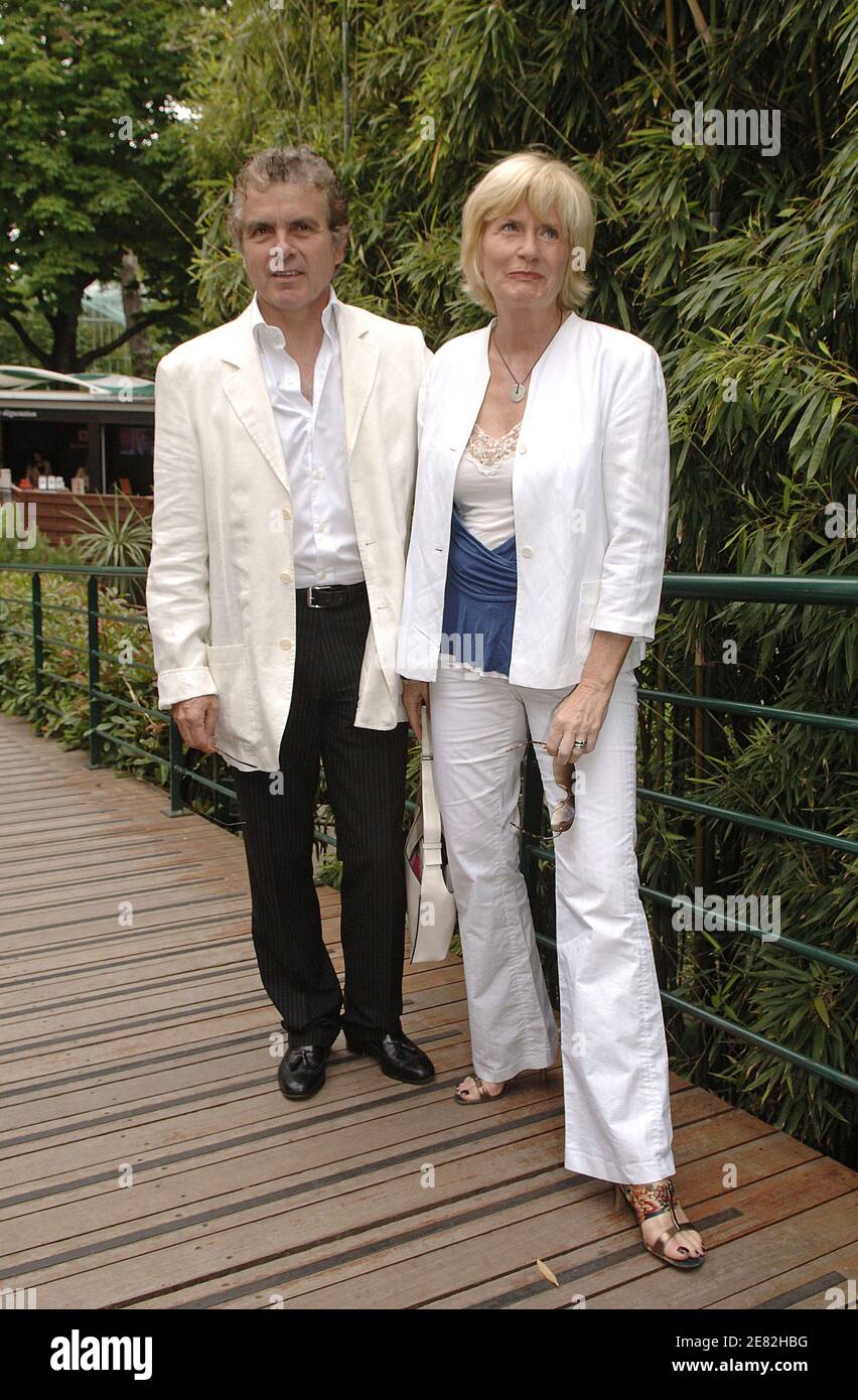 Claude Serillon and his wife Catherine Ceylac arrive in the 'Village', the VIP area of the French Open at Roland Garros arena in Paris, France on June 9, 2007. Photo by Giancarlo Gorassini/ABACAPRESS.COM Stock Photo