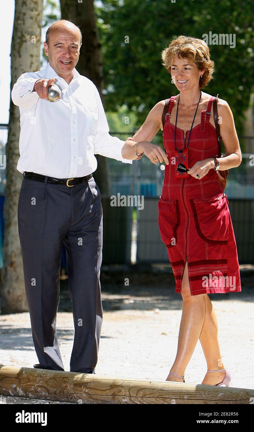 Alain Juppe minister of Environment, Sustainable Development and Regional Development, Bordeaux' mayor, and UMP candidate in the parliamentary elections, talks to his wife Isabelle as they play petanque, in Bordeaux, southwestern France on 14 June 2007. Photo Patrick Bernard/ABACAPRESS.COM Stock Photo