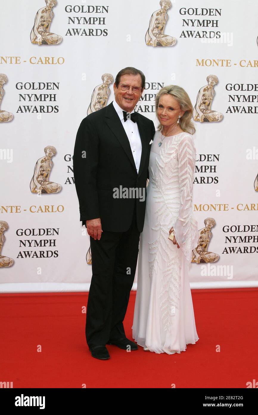 Sir Roger Moore and his wife pose for pictures during the closing ceremony of the 47th Monte-Carlo TV Festival held in Monaco on June 14, 2007. Photo by Denis Guignebourg/ABACAPRESS.COM Stock Photo