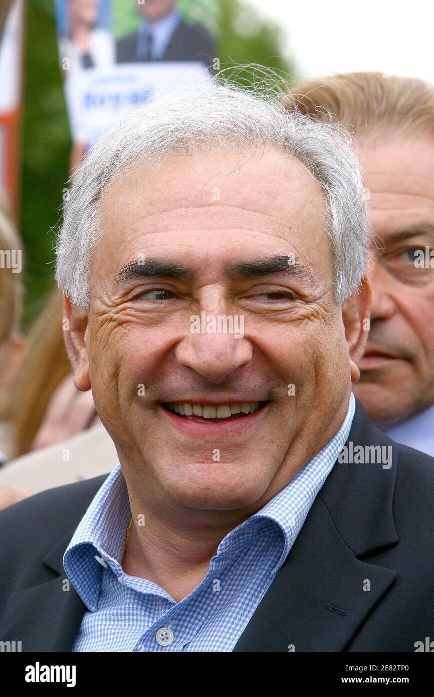 Former socialist Minister Dominique Strauss-Kahn arrives in Gonesse north  of Paris to support Jean-Pierre Blazy, incumbent of the 9th district of Val  d'Oise, during a campaign visit ahead of the second round