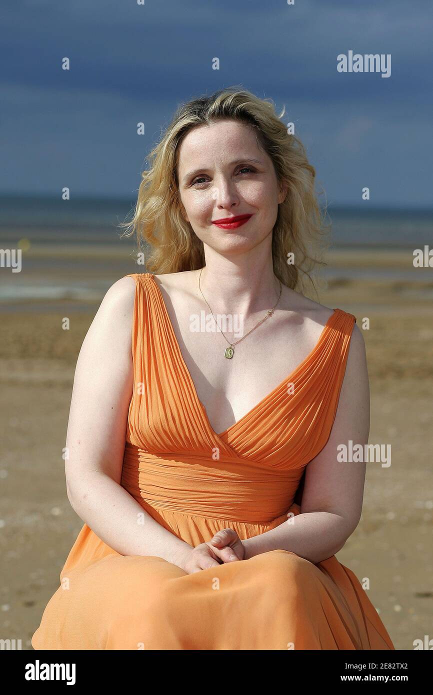French actress Julie Delpy poses for photographers on the beach