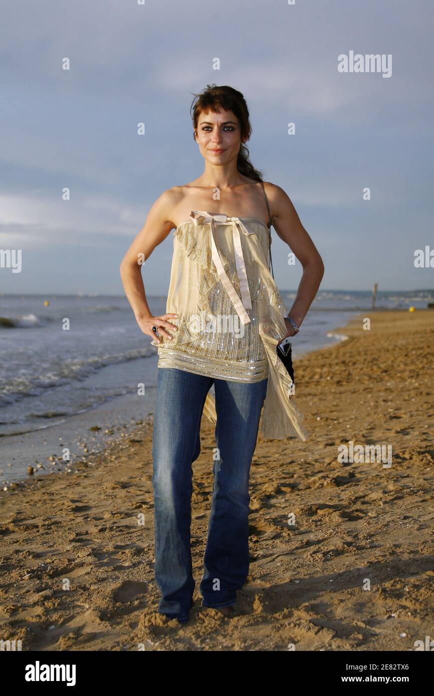 French actress Julie Delpy poses for photographers on the beach