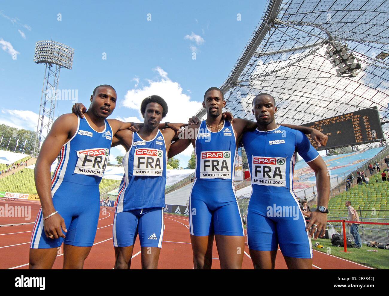 French Athlets (From L to R) Eddy Delepine, Issa Aime N'Thepee, David Alerte and Martial Mbandjock pose at the end of the men's 4x100 meters relay during the Spar European Cup in athletics, in Munich, Germany, on June 23, 2007. Photo by Christophe Guibbaud/Cameleon/ABACAPRESS.COM Stock Photo