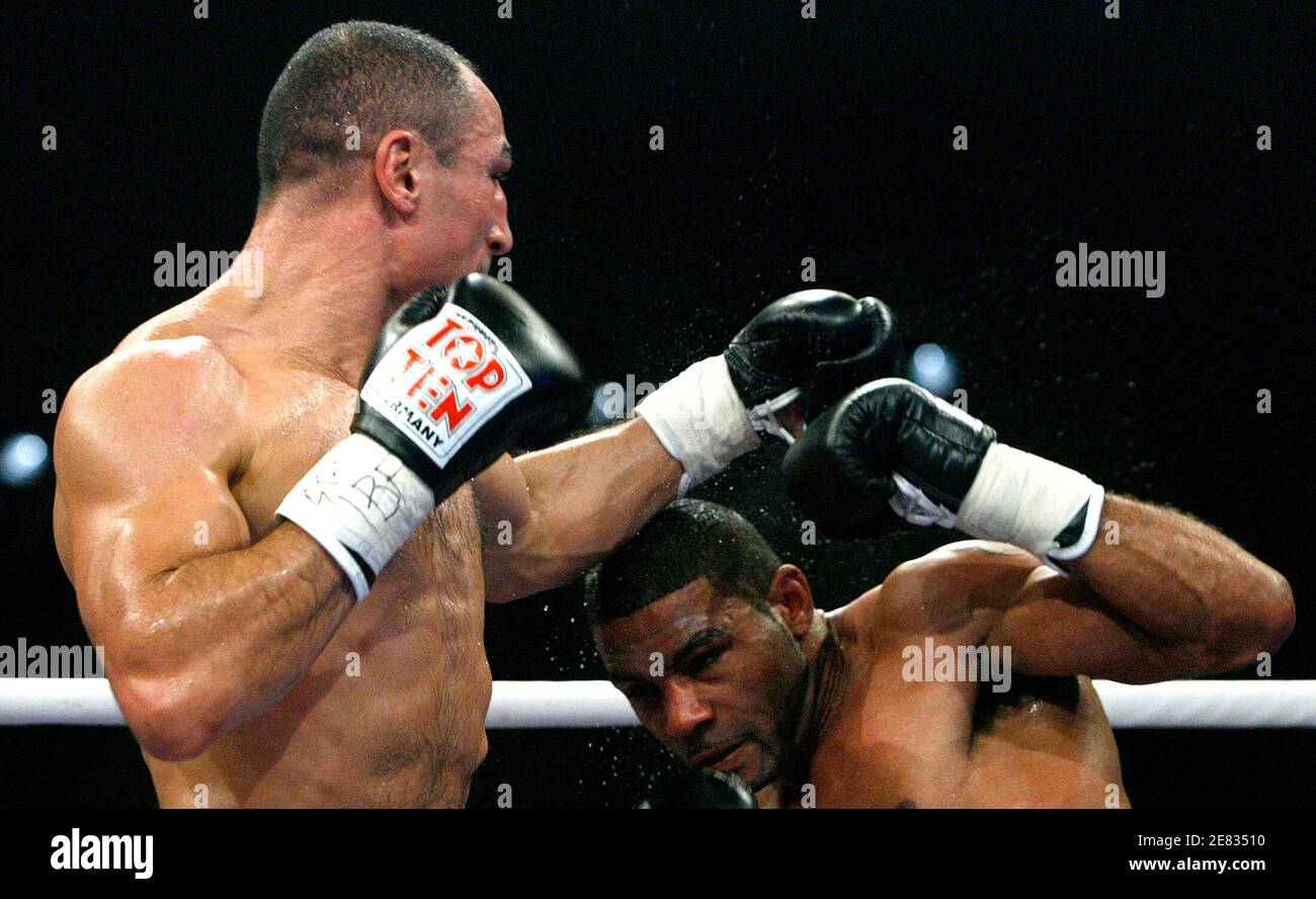 Defending International Boxing Federation (IBF) middleweight World champion  Arthur Abraham (L) of Germany punches his challenger Wayne Elcock of  Britain during the fifth round of their 12-round IBF middleweight boxing  title fight