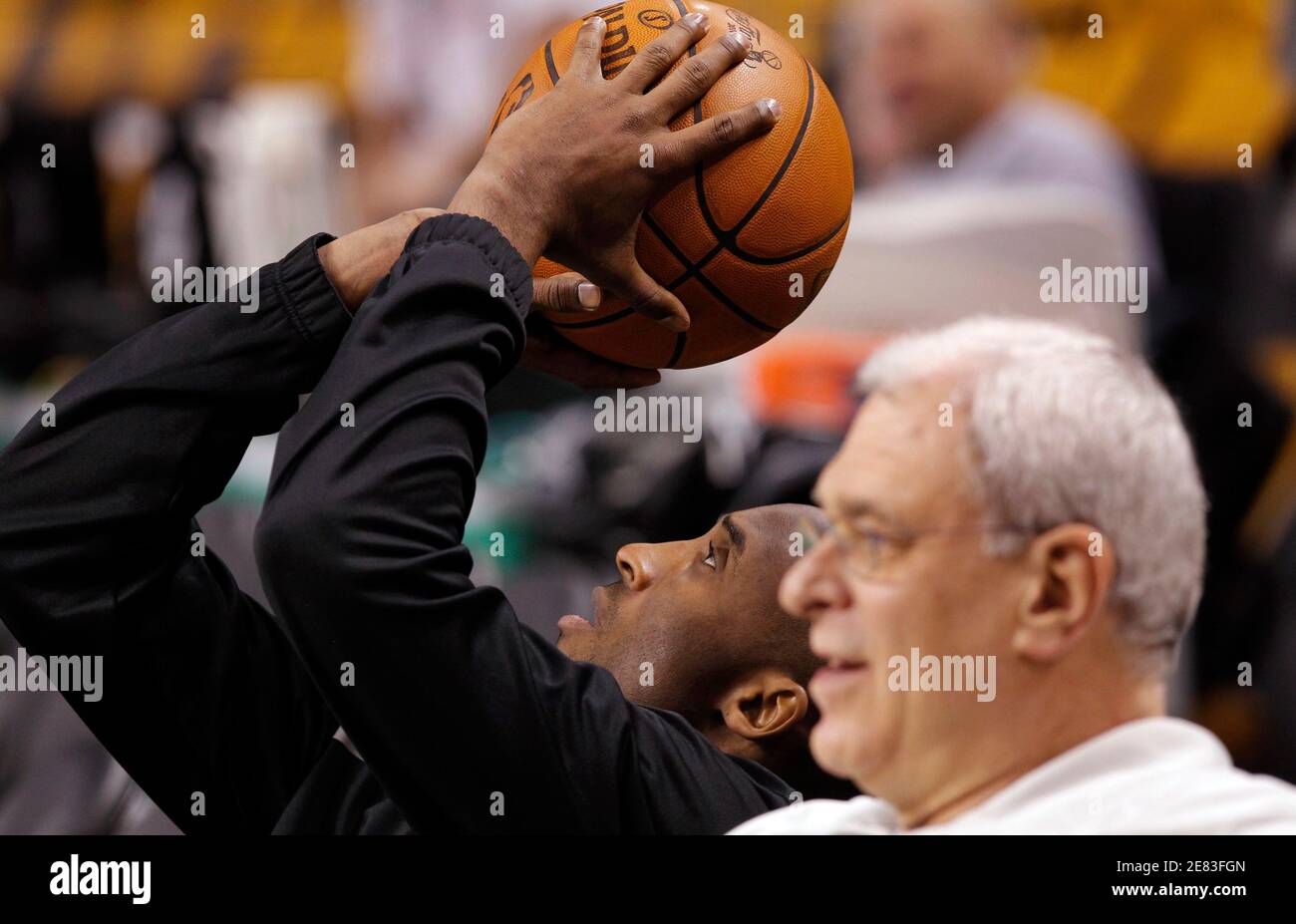 Tosses a basketball hi-res stock photography and images - Alamy