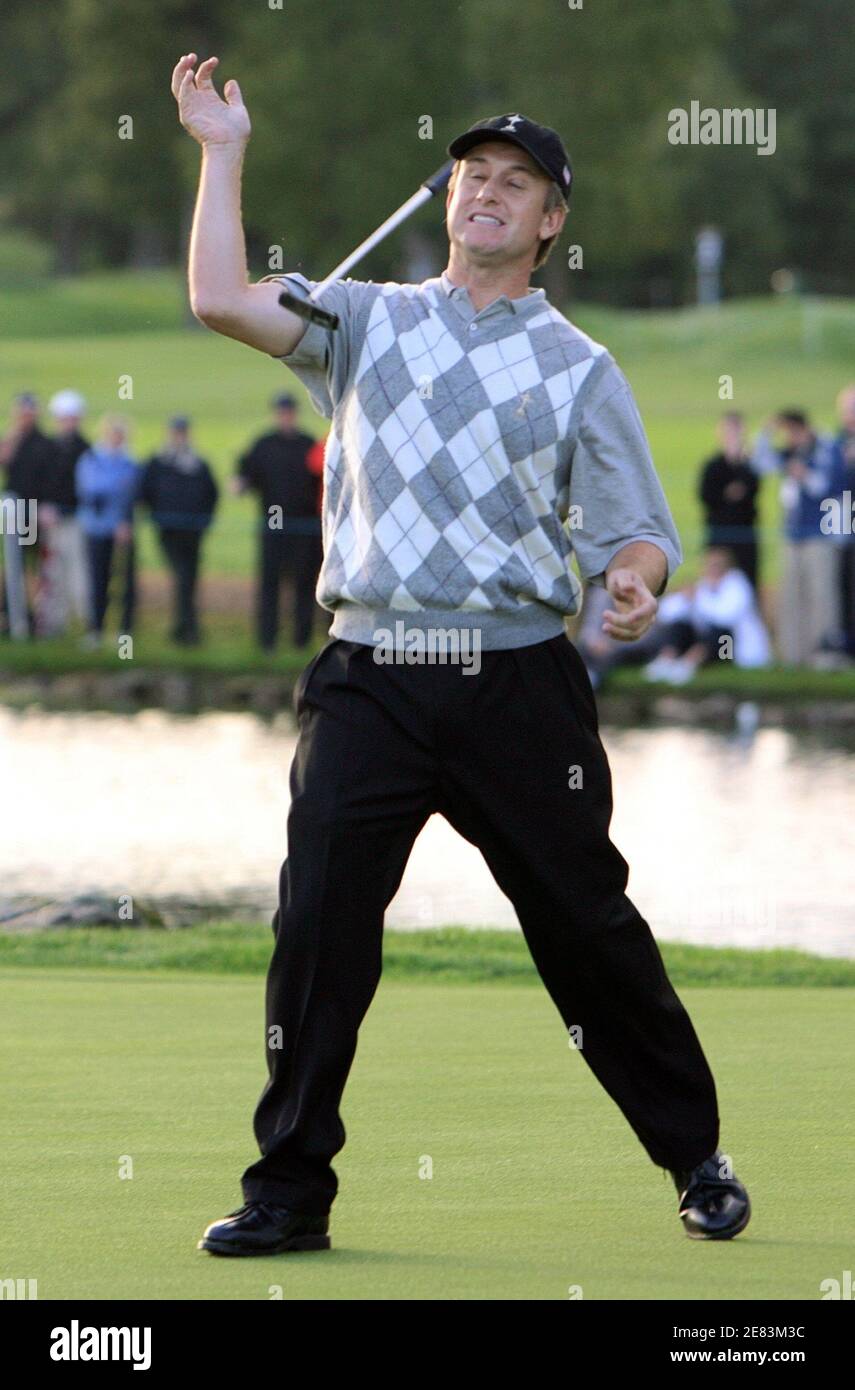 U.S. Ryder Cup player David Toms reacts on the 18th green during their  fourball golf match at the Ryder Cup tournament at The K Club in County  Kildare, Ireland, September 22, 2006.