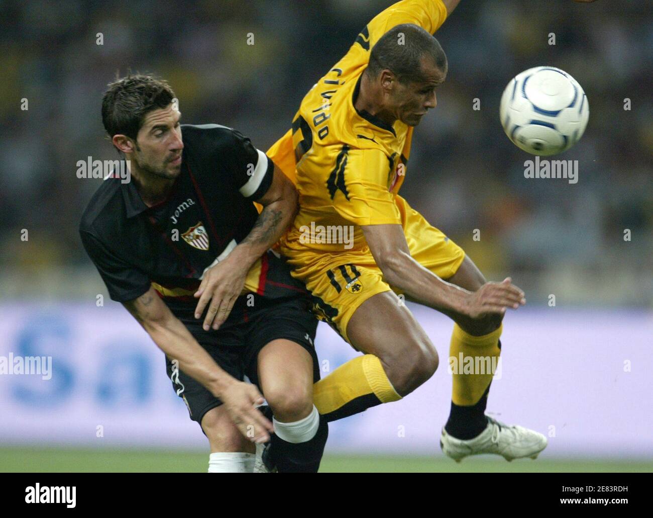 AEK Athens' Rivaldo (R) fights for the ball with Sevilla's Ivica  Dragutinovic during their Champions League qualifying soccer match at  Olympic stadium in Athens September 3, 2007. REUTERS/John Kolesidis (GREECE  Stock Photo -