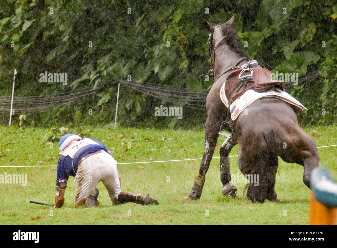 France S Jean Renaud Adde And His Horse Haston D Elpegere Get Up After Slipping In The Mud During The Equestrian Eventing Cross Country Competition At The Beijing 2008 Olympic Games In Hong Kong