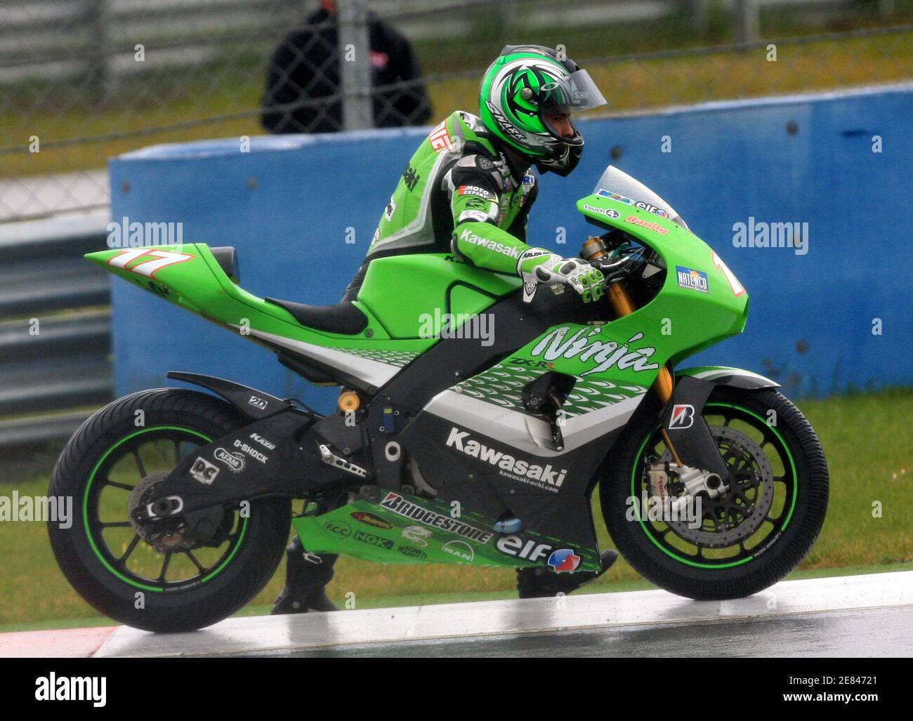 Kawasaki Racing Team MotoGP rider Randy De Puniet of France pushes his  motorcycle in the last lap of a qualifying session at Istanbul Park in  Istanbul April 29, 2006. Chris Vermeulen of