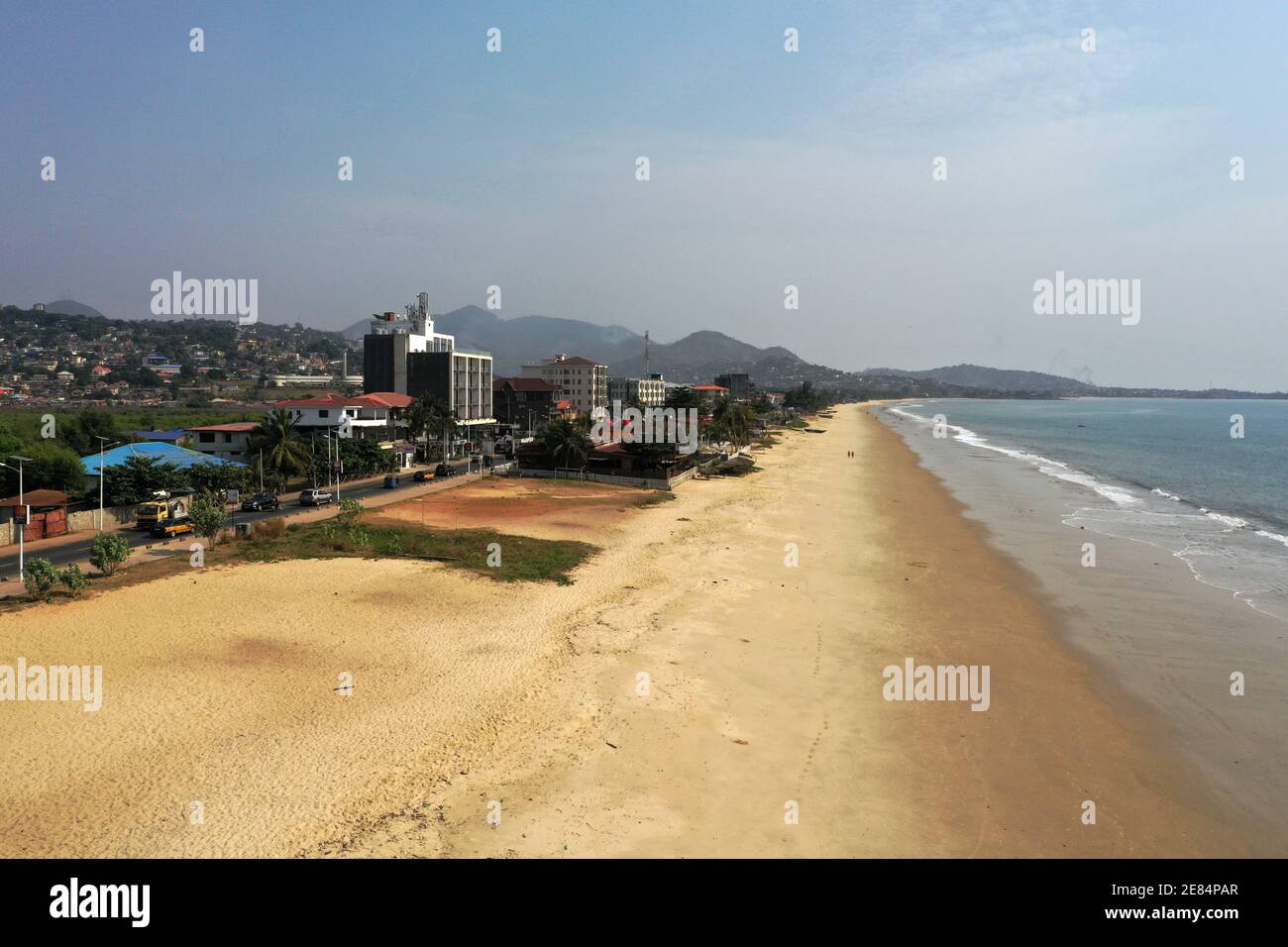 Freetown Sierra Leone Africa sandy beach pollution. West Africa extreme poverty and hunger. Pollution on ocean beaches. Tropical climate environment. Stock Photo