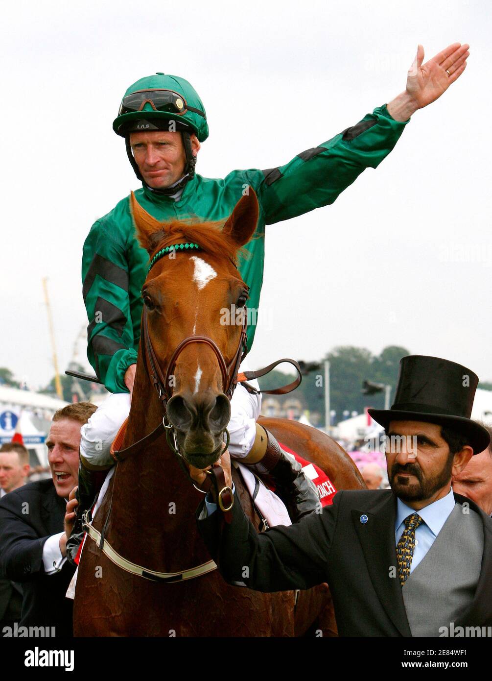 Kevin Manning riding New Approach celebrates after winning the Derby during the Epsom Derby Festival at Epsom Downs in Surrey, southern England, June 7, 2008.  REUTERS/Alessia Pierdomenico (BRITAIN) Stock Photo