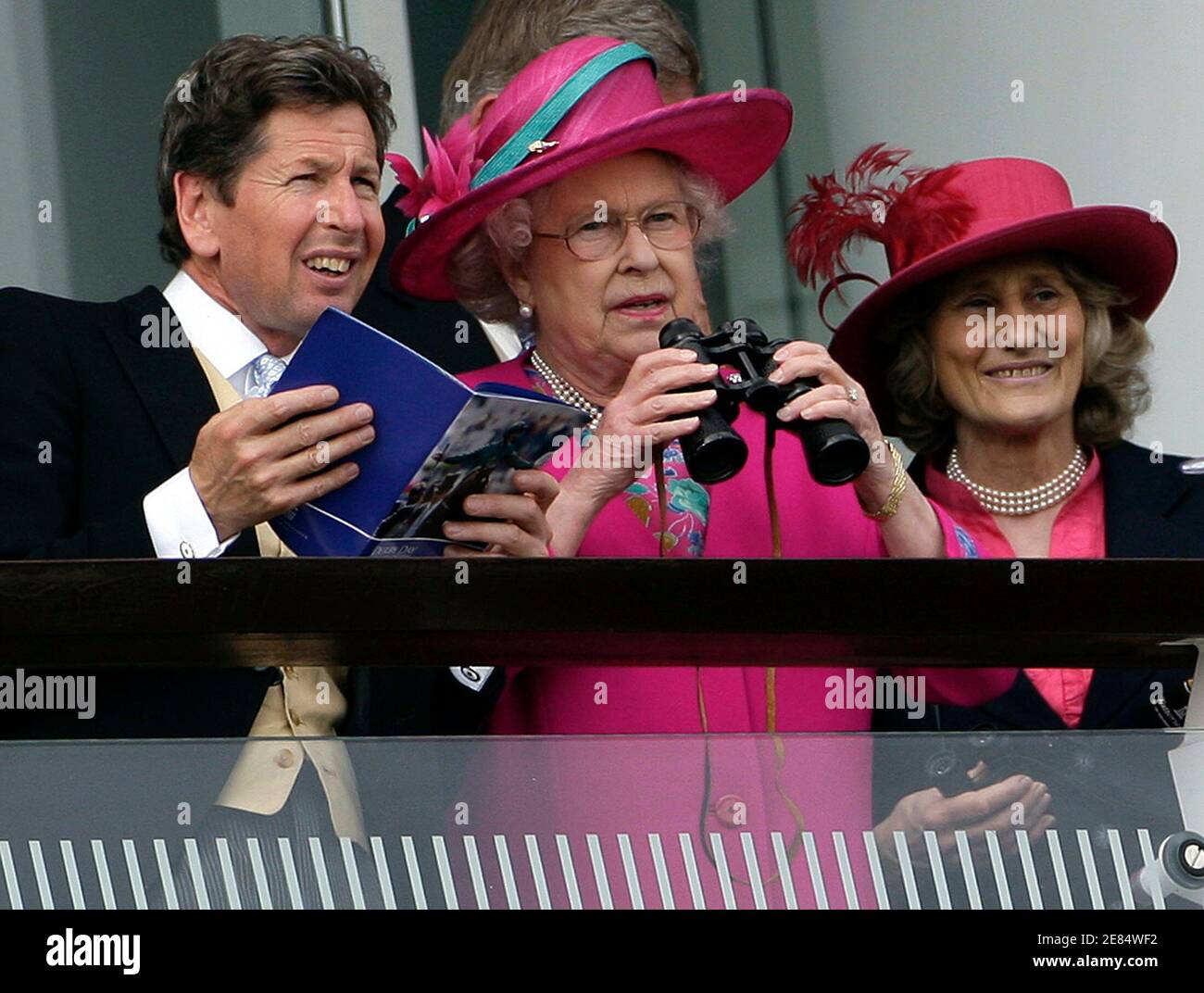 Britain's Queen Elizabeth (C) watches during the Epsom Derby Festival at Epsom Downs in Surrey, southern England, June 7, 2008.    REUTERS/Darren Staples   (BRITAIN) Stock Photo