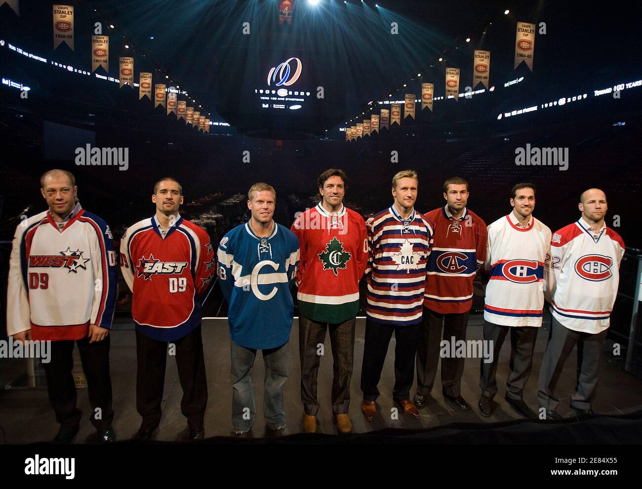 Montreal Canadiens players wear Centennial jerseys as club unveils a new  scoreboard as well as programs leading up to its 100th anniversary taking  place this year, in Montreal, September 24, 2008. (L-R)