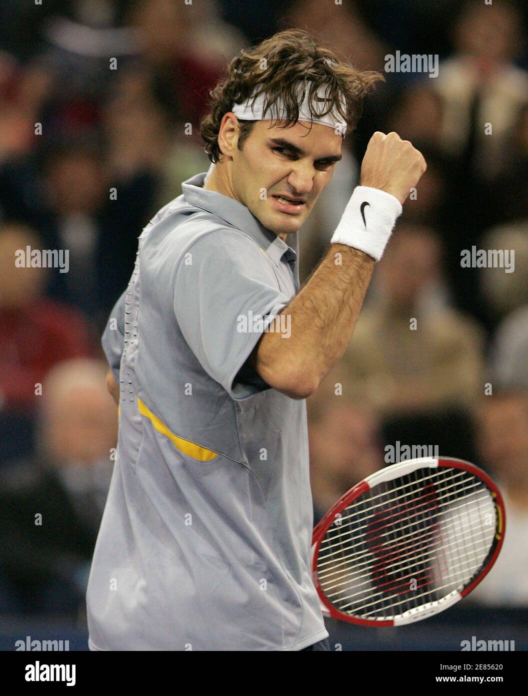 Roger Federer of Switzerland reacts during his semi-final match against Rafael  Nadal of Spain as part of the Masters Cup tennis tournament in Shanghai  November 18, 2006. REUTERS/Aly Song (CHINA Stock Photo -