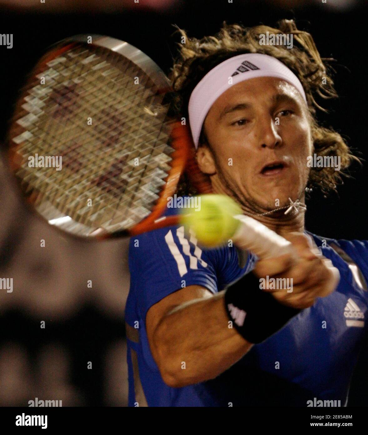 Argentina's Juan Monaco returns the ball to compatriot Juan Pablo Brzezicki during their match at the Mexican Open tennis tournament in Acapulco February 25, 2008. REUTERS/Daniel Aguilar (MEXICO) Stock Photo