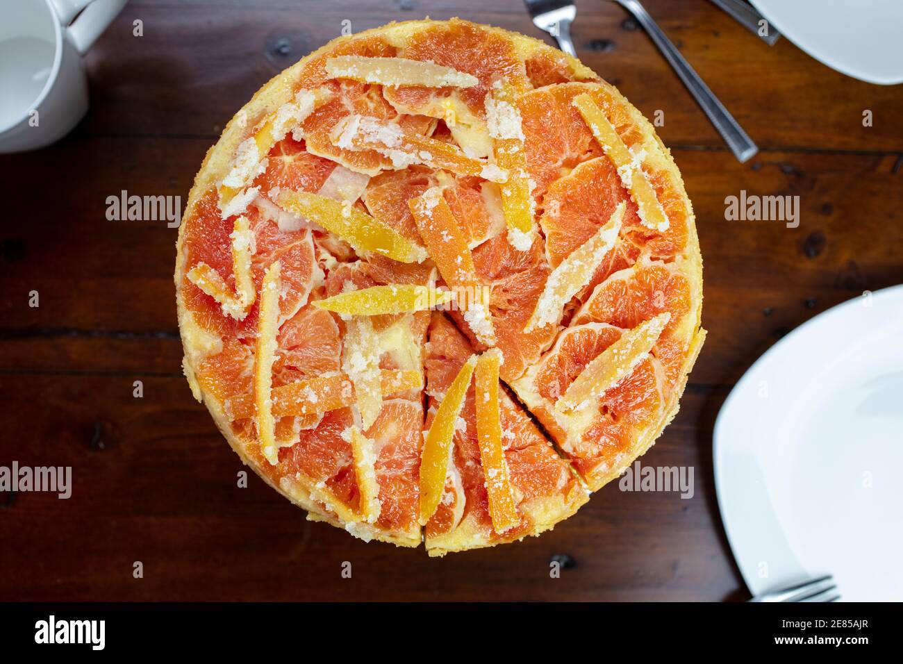 Candied Orange Upside down cake made with orange and lemon rinds on a