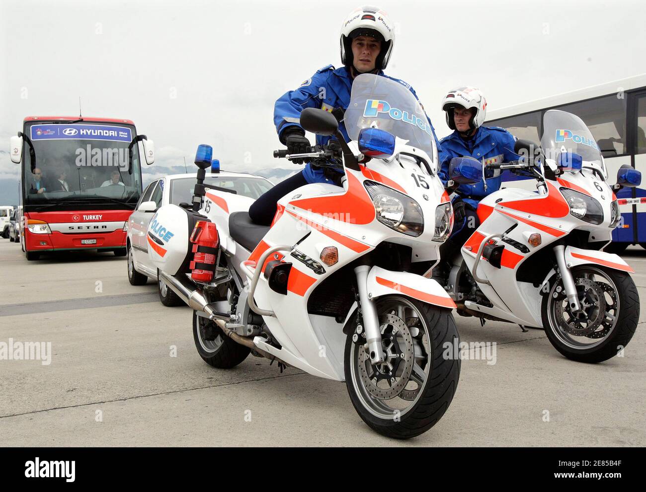 Police escort the team bus of the Turkish national soccer team at Geneva  airport June 1, 2008. Geneva is one of the Swiss hosts for the Euro 2008  which will be co-hosted