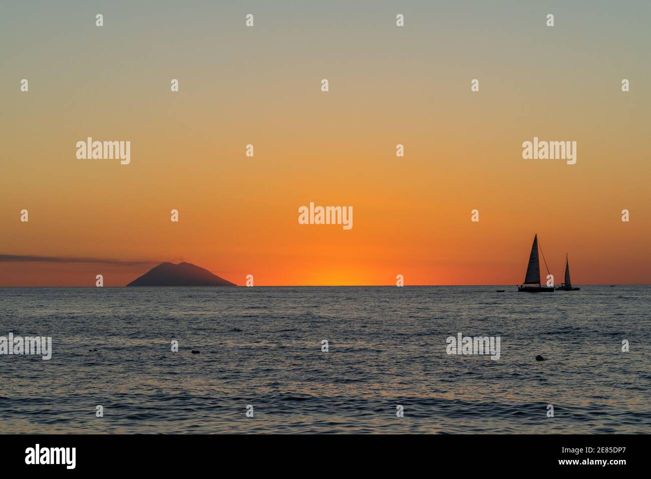 Beautiful Sunset Over Tyrrhenian Sea And Stromboli Island With A Sailboat Viewed From Tropea Calabria Italy Stock Photo Alamy