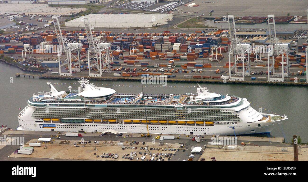 The Freedom of the Seas, the world's largest cruise ship, sits at the dock in Bayonne, New Jersey, across from New York City, May 11, 2006. The ship can hold over 3, 600 guests, is 15 decks high and is the length of 37 buses.  REUTERS/Chip East Stock Photo