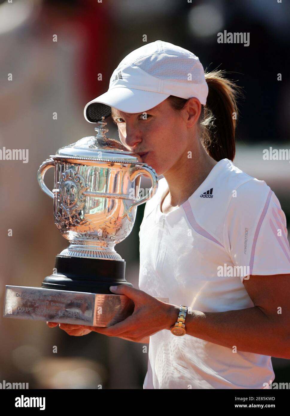 Belgium's Justine Henin-Hardenne kisses her trophy after winning the final  against[Russia's Svetlana Kuznetsova] in the French Open tennis tournament  at Roland Garros in Paris, June 10, 2006 Stock Photo - Alamy