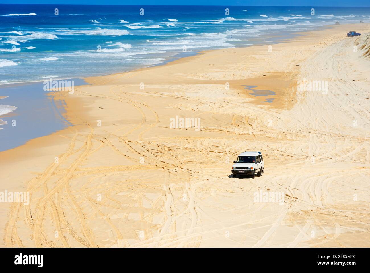 Four wheel drive on Seventy Five Mile Beach, Great Sandy National Park, Fraser Island, Queensland, Australia Stock Photo