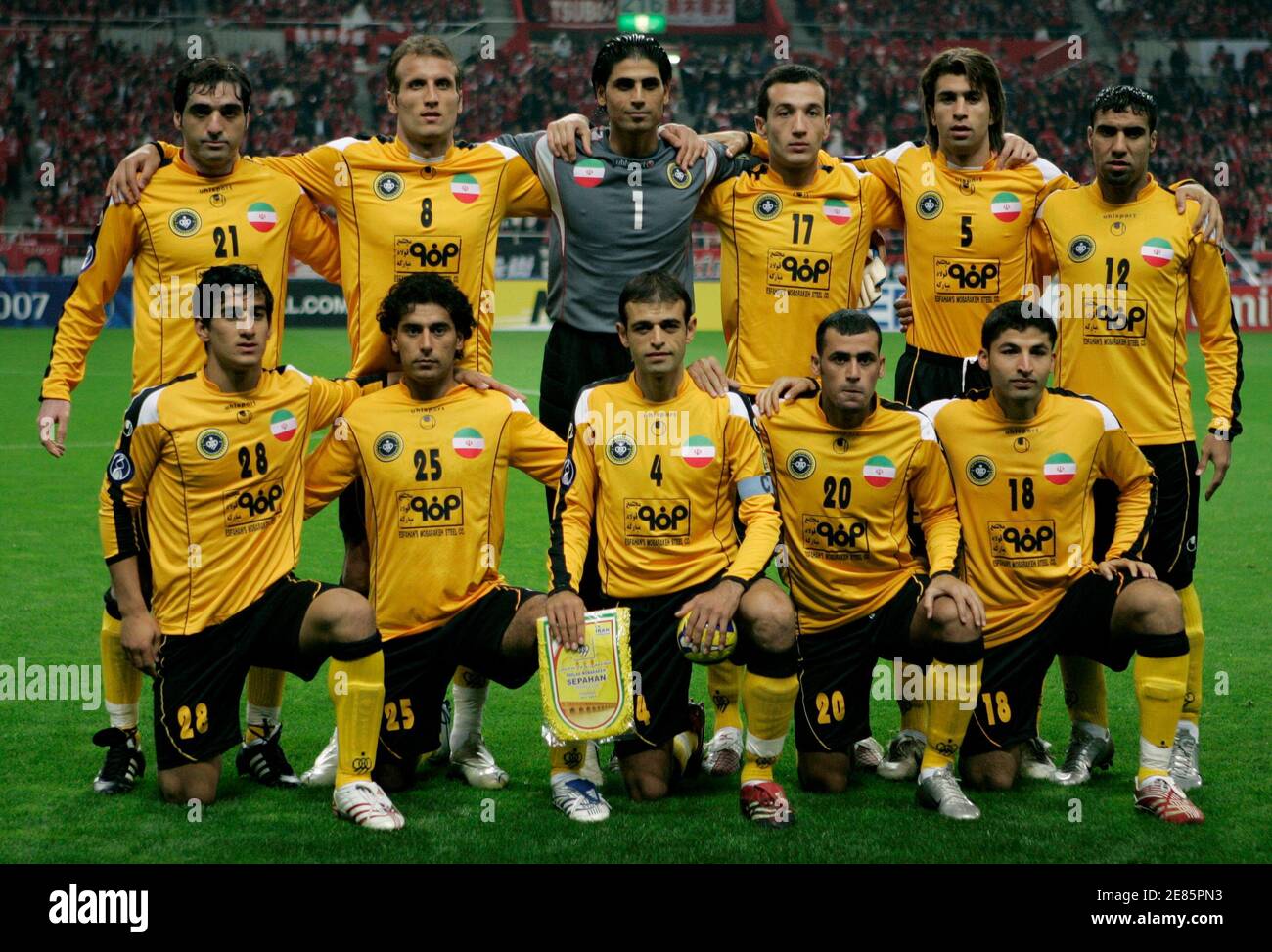Players of Iran's Sepahan pose for a team photo before their Asian Football Confederation (AFC) Champions League final second leg soccer match against Japan's Urawa Red Diamonds in Saitama, north of Tokyo, November 14, 2007. Urawa Reds clinched the AFC Champions League title when they beat Iran's Sepahan 2-0 in match on Wednesday for a 3-1 aggregate victory in the final. Front L-R: Ehsan Hajysafi, Ebrahim Loveinian, Moharram Navidkia, Emad Ridha and Mohsen Hamidi. Rear back L-R: Saeid Mirgeloui Bayat, Mohsen Bengar, Abbas Mohammadi Shah Abadi, Jaba Mujiri, Seyed Hadi Aghily Anvar and Abdul Wah Stock Photo