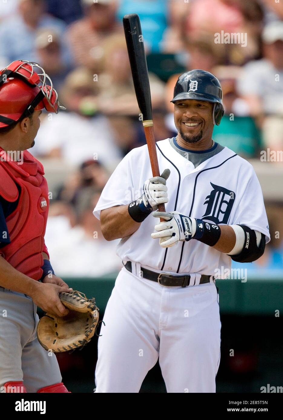 Detroit Tigers' Gary Sheffield (R) laughes with Washington Nationals catcher Wil Nieves during their spring training baseball game in Lakeland, Florida March 18, 2008.  REUTERS/Scott Audette (UNITED STATES) Stock Photo