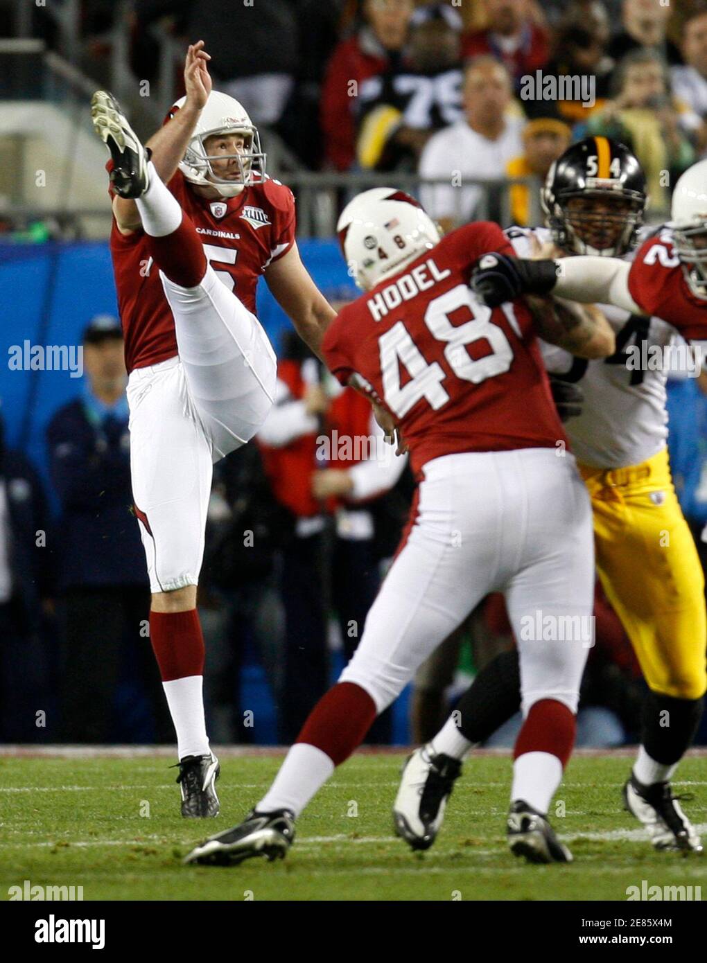 Arizona Cardinals kicker Ben Graham (L) punts against the Pittsburgh  Steelers as Cardinals teammate Nathan Hodel (48) blocks during the first  quarter of the NFL's Super Bowl XLIII football game in Tampa,