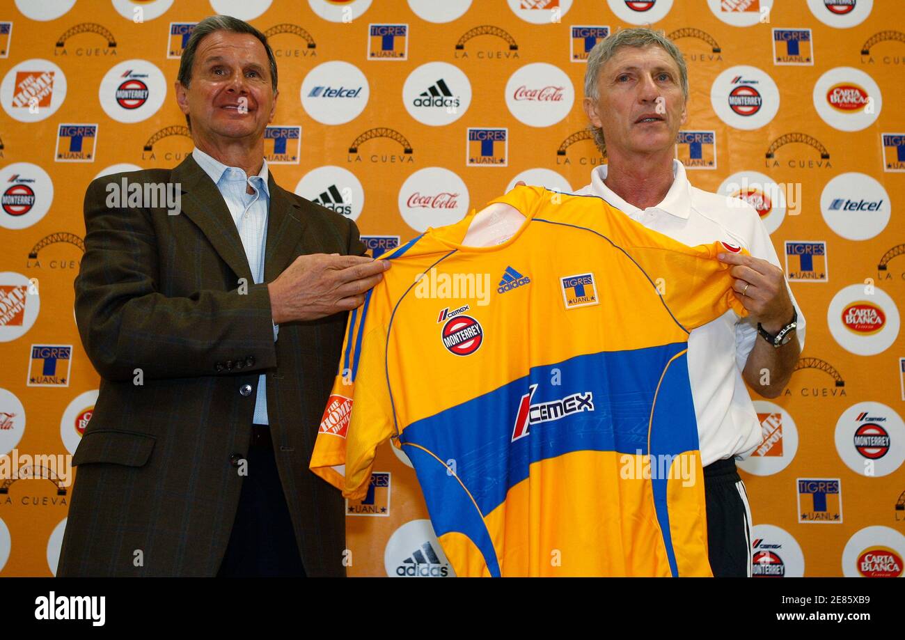 Tigres UANL's new coach Jose Pekerman of Argentina (R) poses with chairman Enrique  Borja after a news conference at the club's training facilities in Zuazua,  on the outskirts of Monterrey, northern Mexico