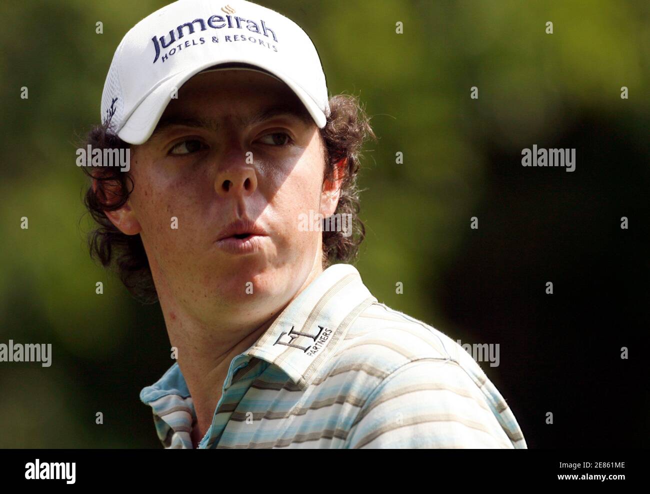 Rory McIlroy of Northern Ireland whistles as he walks down the 12th fairway during the final round of the Quail Hollow Championship in Charlotte, North Carolina May 2, 2010. REUTERS/Jason Miczek (UNITED STATES - Tags: SPORT GOLF) Stock Photo