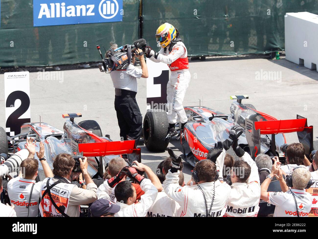 McLaren Formula One driver Lewis Hamilton of Britain celebrates after winning the Canadian F1 Grand Prix in Montreal, June 13, 2010.      REUTERS/Chris Wattie (CANADA - Tags: SPORT MOTOR RACING) Stock Photo