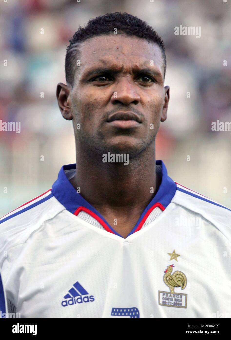 Olympique Lyon defender Eric Abidal, seen in this file photo from November  9, 2005 in La Martinique, listens to national athems before a friendly  international soccer match against Costa Rica where he