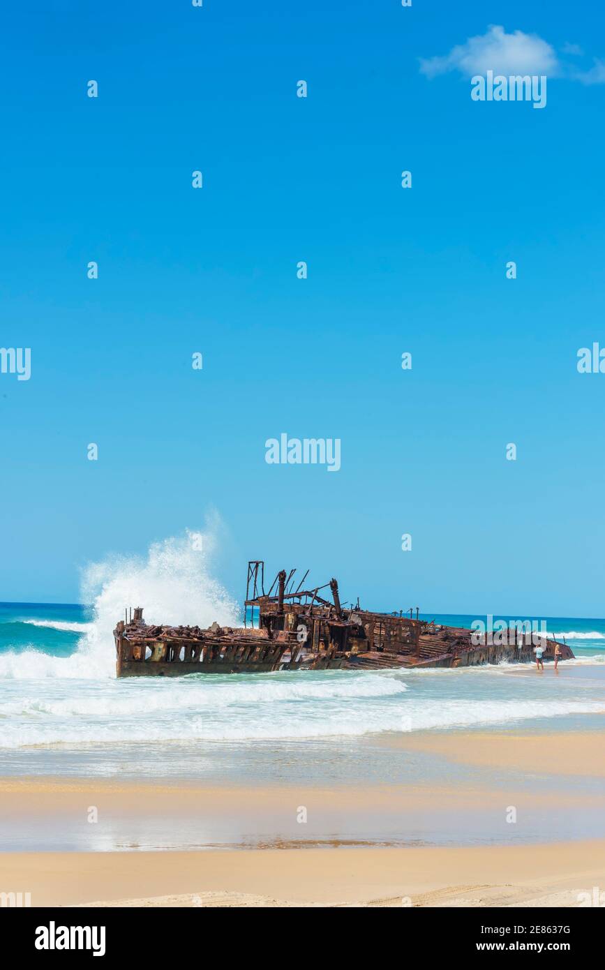 The rusting hulk of the Maheno Shipwreck, Fraser Island, Queensland, Australia, Stock Photo