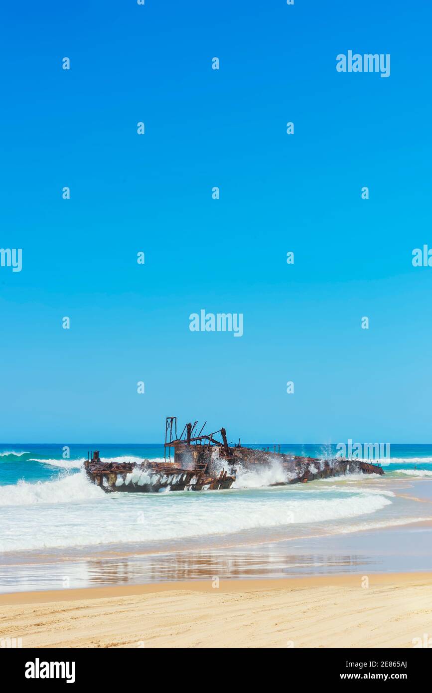 The rusting hulk of the Maheno Shipwreck, Fraser Island, Queensland, Australia, Stock Photo