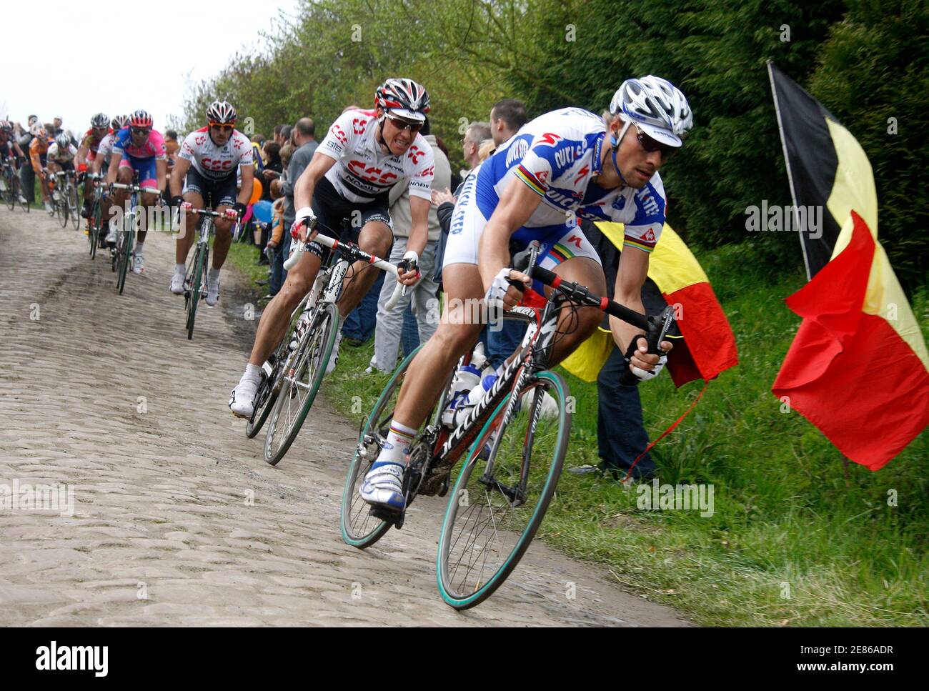 Quick Step team rider Tom Boonen of Belgium leads CSC's Fabian Cancellara  of Switzerland on the cobble stones section in Orchies during the  Paris-Roubaix classic cycling race, April 13, 2008. REUTERS/Pascal  Rossignol (