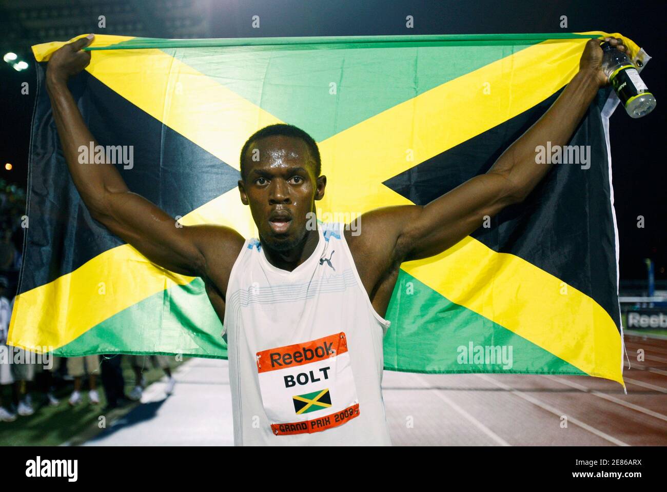 Usain Bolt of Jamaica celebrates after setting a new world record in the  men's 100 meters race next at the Reebok Grand Prix athletics meet in New  York, May 31, 2008. Bolt