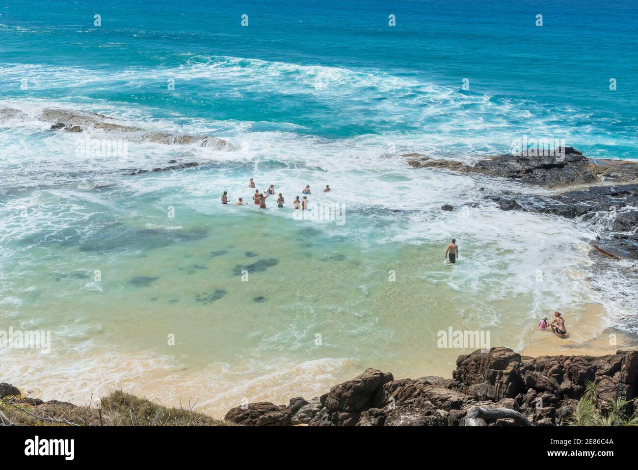 People swimming in Champagne pools, Great Sandy National Park, Fraser Island, Queensland, Australia, Stock Photo